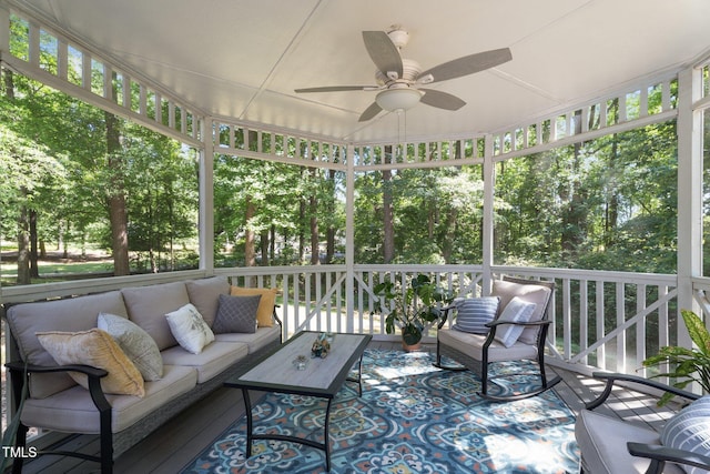 6517 Hidden Pond Rd, Wendell, NC 27591 - sunroom with outdoor lounge area, a ceiling fan, and view of wooded area