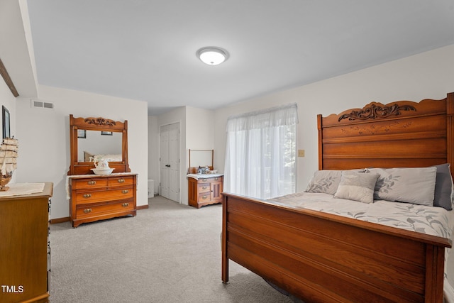 6517 Hidden Pond Rd, Wendell, NC 27591 - bedroom featuring light carpet and baseboards