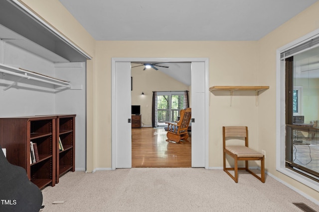 interior space featuring carpet flooring and baseboards