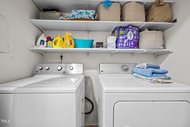laundry room with independent washer and dryer