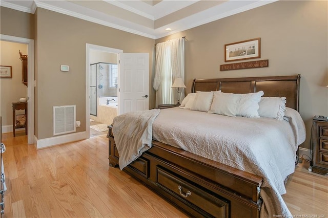 bedroom with crown molding, light wood finished floors, baseboards, connected bathroom, and recessed lighting