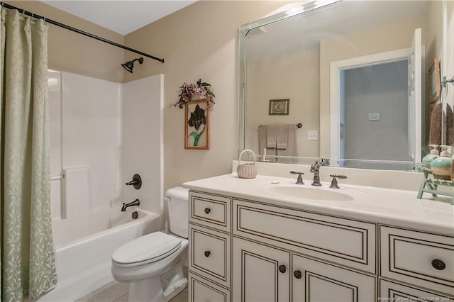 full bathroom with toilet, shower / bath combo, and vanity