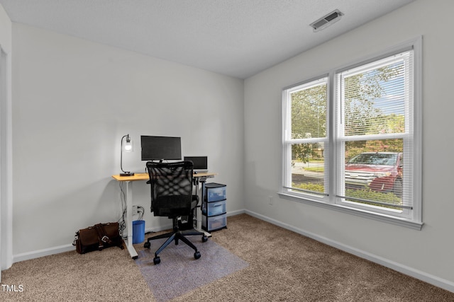 office area featuring carpet floors and baseboards