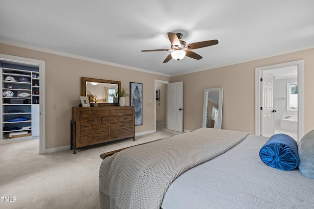18 Acornridge Ct, Durham, NC 27707 - carpeted bedroom with a spacious closet, crown molding, connected bathroom, baseboards, and a closet