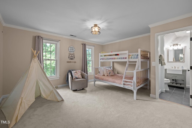 18 Acornridge Ct, Durham, NC 27707 - bedroom featuring carpet flooring, crown molding, baseboards, a sink, and ensuite bathroom