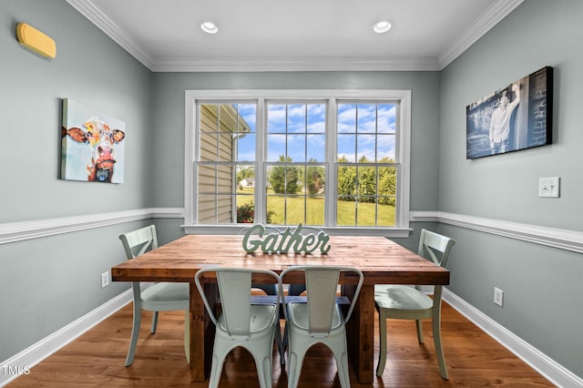 281 Derwin Dr, Timberlake, NC 27583 - dining area featuring baseboards, crown molding, wood finished floors, and recessed lighting