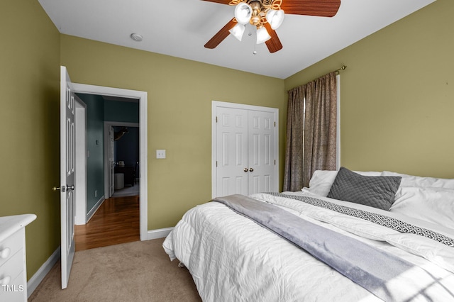 281 Derwin Dr, Timberlake, NC 27583 - bedroom featuring baseboards, light carpet, a closet, and a ceiling fan