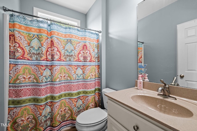 281 Derwin Dr, Timberlake, NC 27583 - full bathroom with vanity, toilet, and a shower with shower curtain