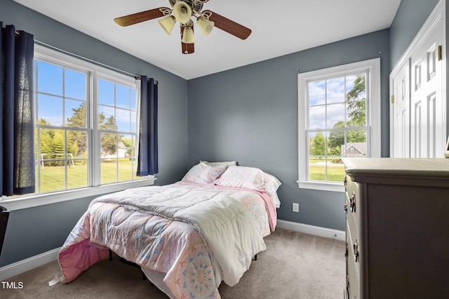 281 Derwin Dr, Timberlake, NC 27583 - bedroom featuring light colored carpet, baseboards, and ceiling fan