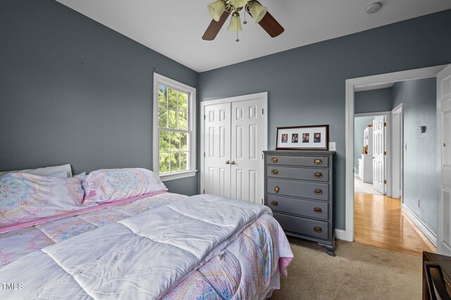 281 Derwin Dr, Timberlake, NC 27583 - bedroom featuring a closet, light colored carpet, a ceiling fan, and baseboards