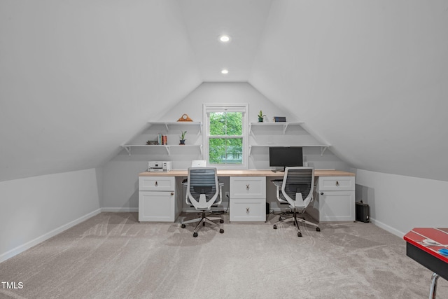 office space with lofted ceiling, baseboards, light carpet, and recessed lighting