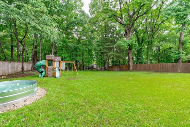 view of yard featuring a playground