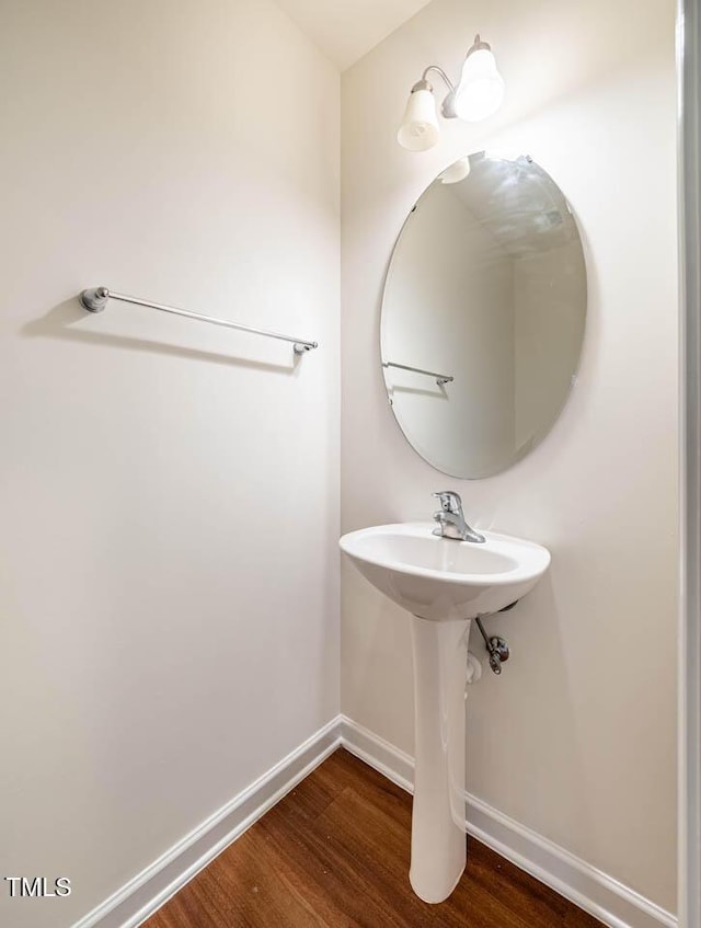 3623 Landshire View Ln, Raleigh, NC 27616 - bathroom with wood finished floors and baseboards