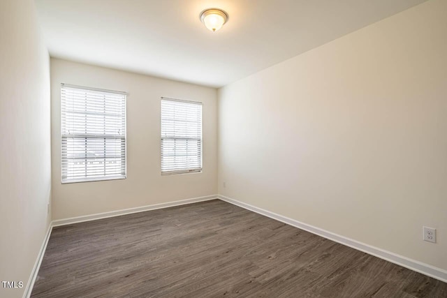 3623 Landshire View Ln, Raleigh, NC 27616 - unfurnished room featuring dark wood-style flooring and baseboards