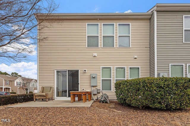 rear view of house with a patio area
