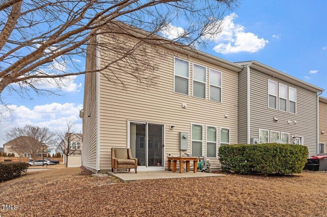 rear view of property with a patio