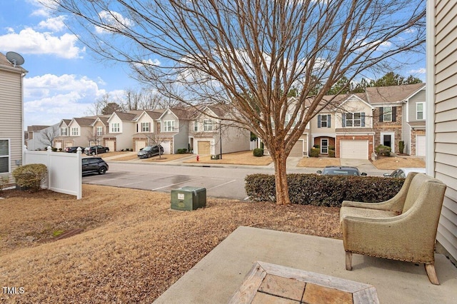 view of yard featuring a residential view