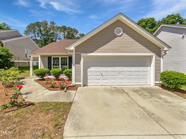 5612 Tealbrook Dr, Raleigh, NC 27610 - view of front of home featuring concrete driveway and an attached garage