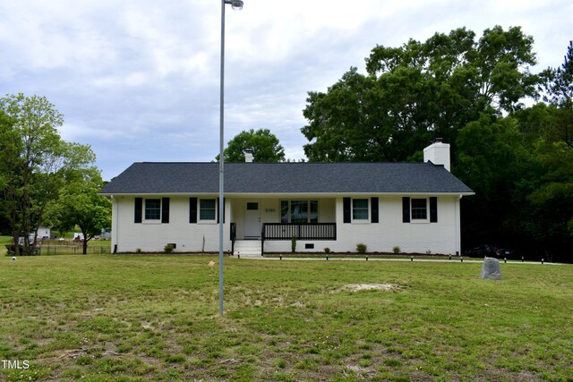 3141 Wagoner Ln Unit 09, Graham, NC 27253 - ranch-style home with a chimney, brick siding, and covered porch