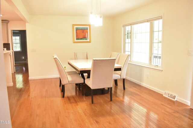 3141 Wagoner Ln Unit 09, Graham, NC 27253 - dining space with light wood-style floors and baseboards