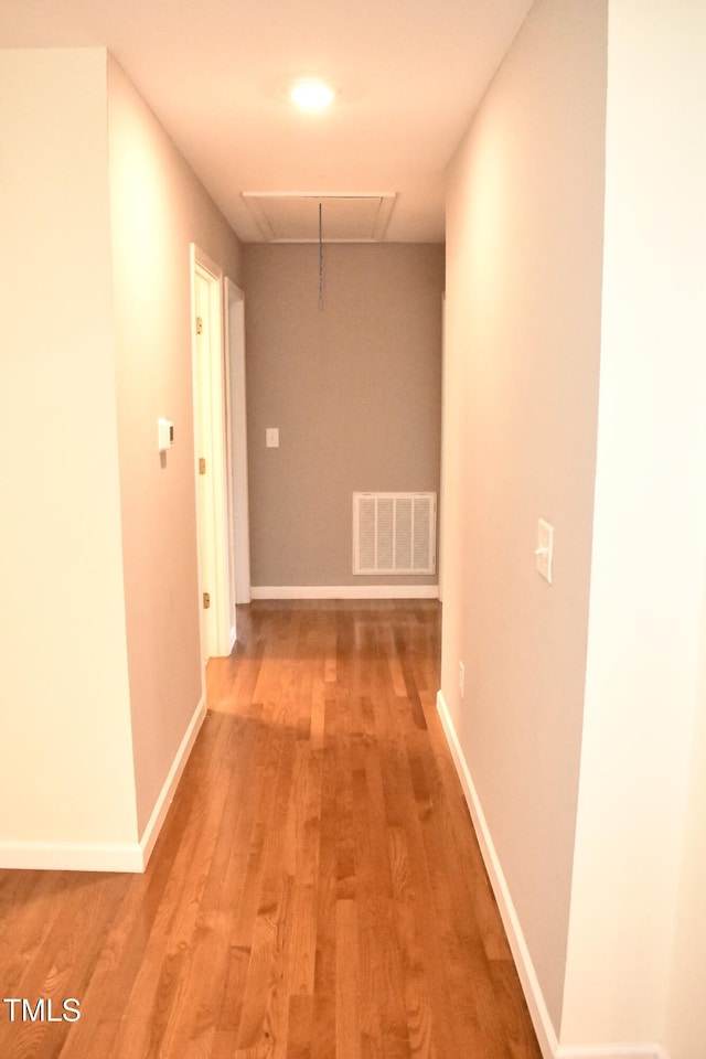 3141 Wagoner Ln Unit 09, Graham, NC 27253 - hall with attic access, light wood-style floors, and baseboards
