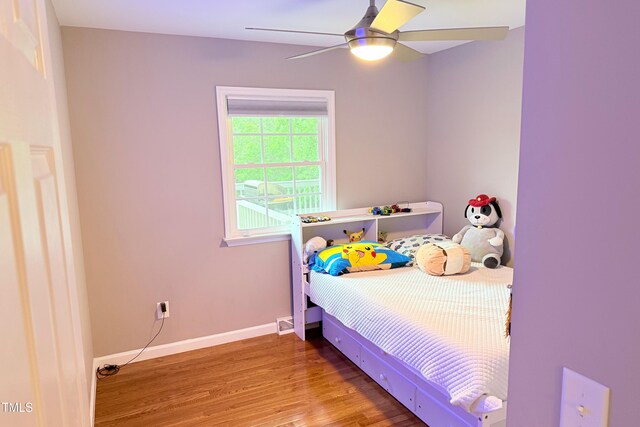 3141 Wagoner Ln Unit 09, Graham, NC 27253 - bedroom featuring wood finished floors, baseboards, and ceiling fan
