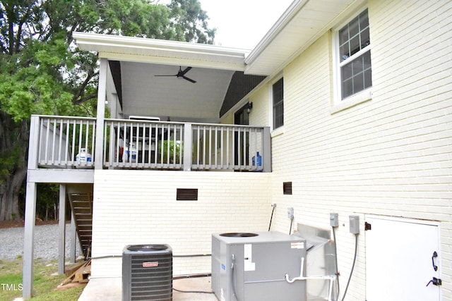 3141 Wagoner Ln Unit 09, Graham, NC 27253 - view of home's exterior with stairway, central AC, a wooden deck, and ceiling fan