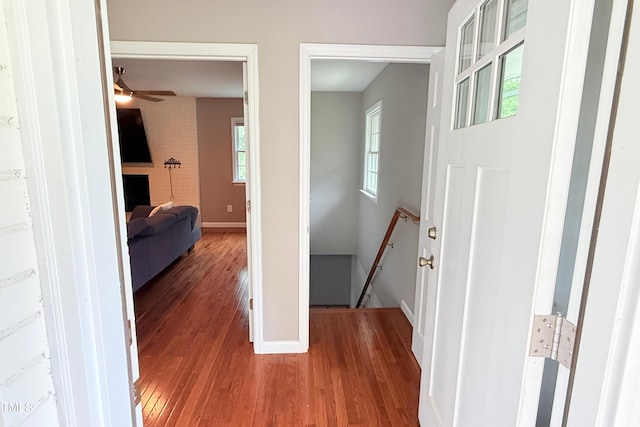 3141 Wagoner Ln Unit 09, Graham, NC 27253 - hall with an upstairs landing, wood finished floors, and baseboards