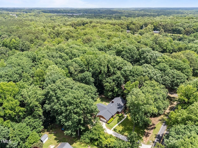 3204 Manor Ridge Dr, Raleigh, NC 27603 - drone / aerial view of a heavily wooded area