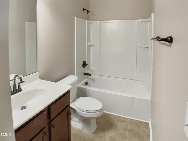 bathroom with toilet, vanity, shower / bathtub combination, and tile patterned floors