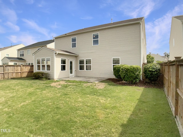rear view of house featuring a patio area