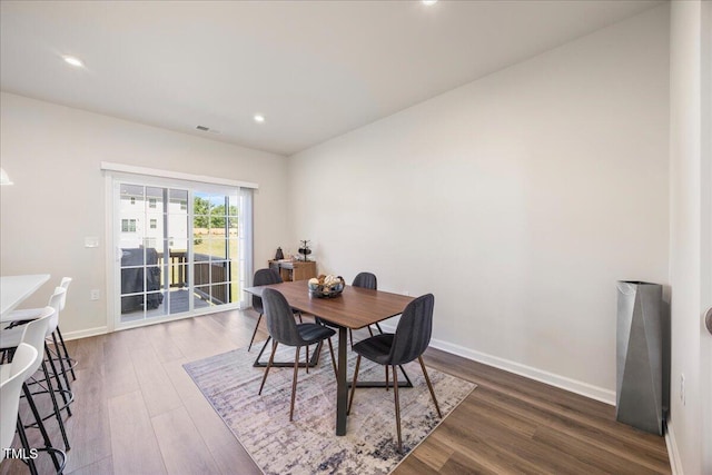 926 Romeria Dr, Durham, NC 27713 - dining area featuring wood finished floors, baseboards, and recessed lighting