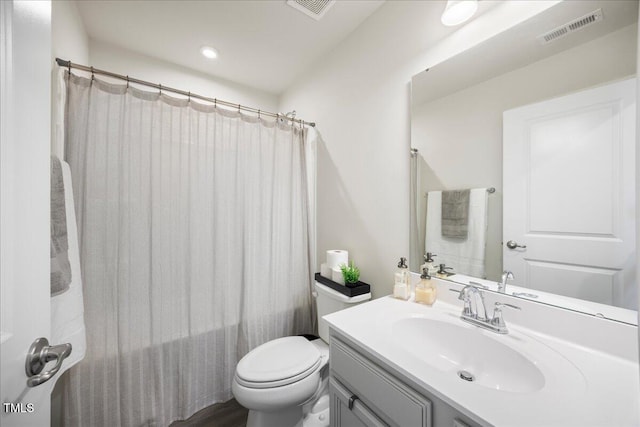 926 Romeria Dr, Durham, NC 27713 - bathroom with toilet, vanity, and a shower with curtain