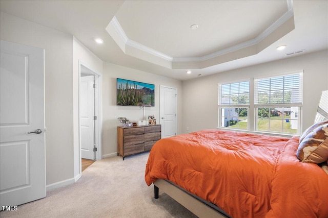 926 Romeria Dr, Durham, NC 27713 - bedroom with crown molding, a raised ceiling, recessed lighting, light carpet, and baseboards