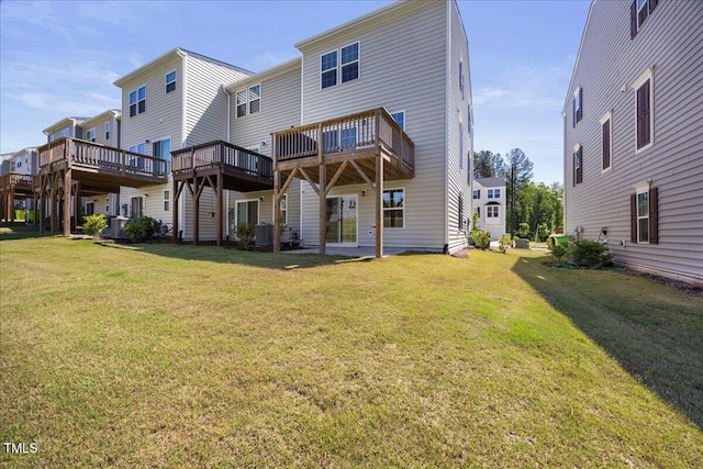 926 Romeria Dr, Durham, NC 27713 - rear view of house with a yard, a wooden deck, and central air condition unit