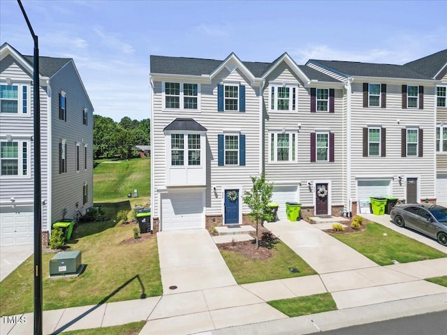 926 Romeria Dr, Durham, NC 27713 - multi unit property featuring driveway, an attached garage, a front yard, and stone siding
