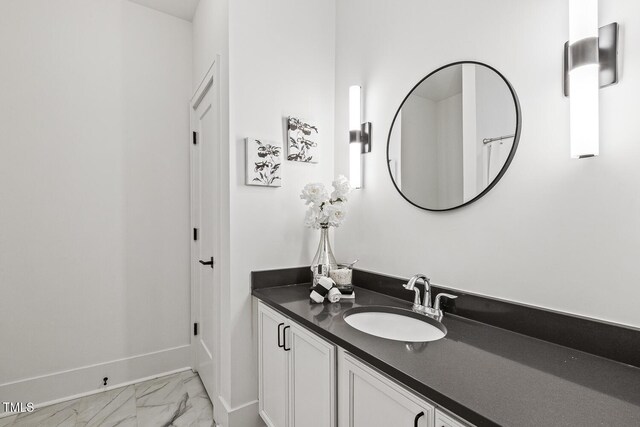 13417 New Light Rd, Raleigh, NC 27614 - bathroom with marble look tiles and vanity