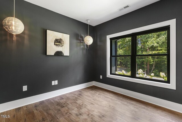 13417 New Light Rd, Raleigh, NC 27614 - empty room with wood finished floors and baseboards
