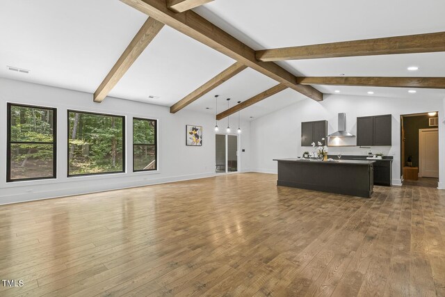 13417 New Light Rd, Raleigh, NC 27614 - unfurnished living room featuring light wood-style floors and recessed lighting