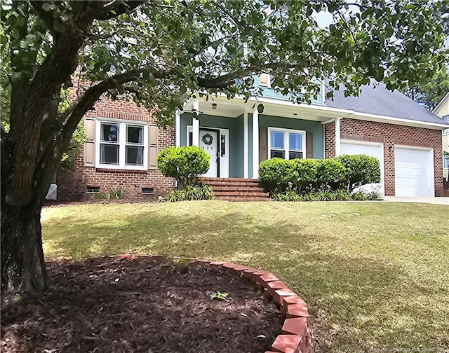 view of front of house with brick siding, a garage, crawl space, and a front yard