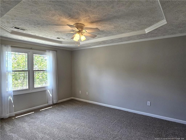 unfurnished room featuring crown molding, baseboards, a ceiling fan, a textured ceiling, and carpet flooring