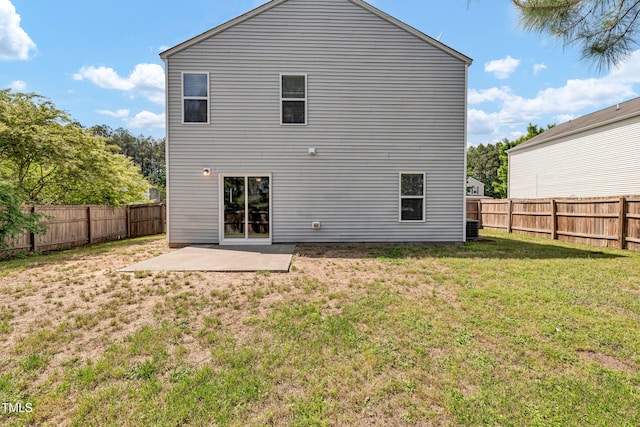 rear view of property featuring a patio