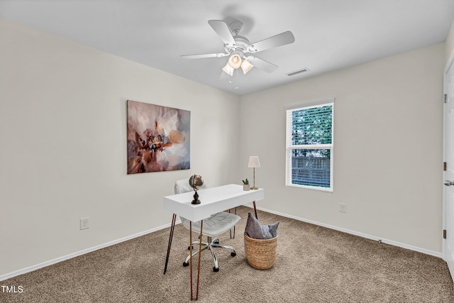 office with carpet, ceiling fan, and baseboards