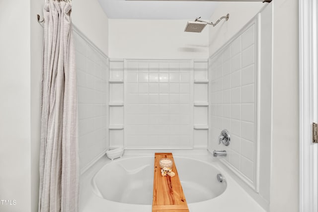 bathroom with shower / bath combo