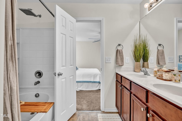 ensuite bathroom with double vanity and shower / tub combo