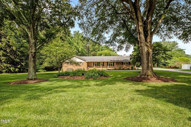 913 Milton Rd, Durham, NC 27712 - view of front facade featuring a front yard