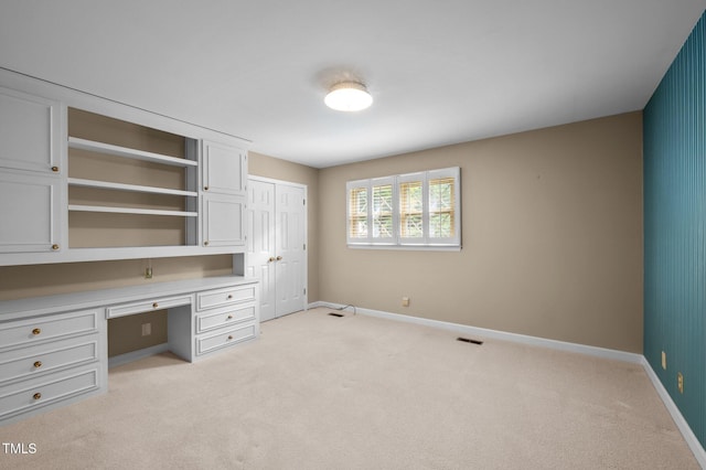 913 Milton Rd, Durham, NC 27712 - unfurnished office featuring built in desk and light colored carpet