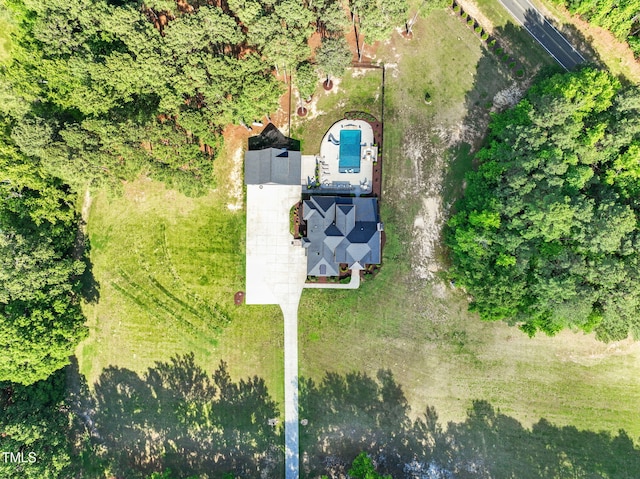 view of subject property featuring a pool area