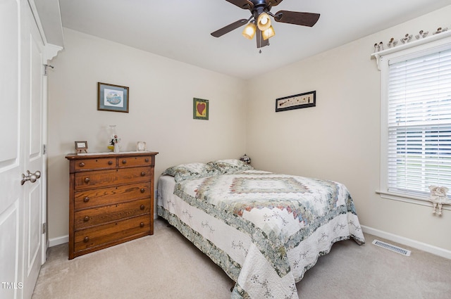 59 Long Grass Dr, Smithfield, NC 27577 - bedroom featuring light colored carpet, baseboards, and ceiling fan