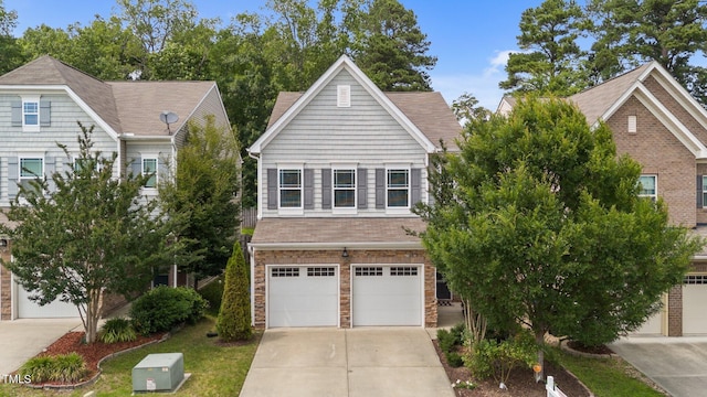 2057 Tanners Mill Dr, Durham, NC 27703 - view of front of house featuring concrete driveway and an attached garage